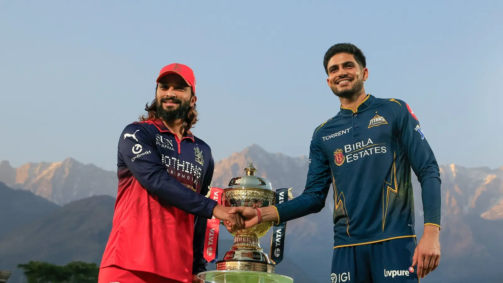 Rajat Patidar shakes hands with Subman Gill before the match in New Chadigarh